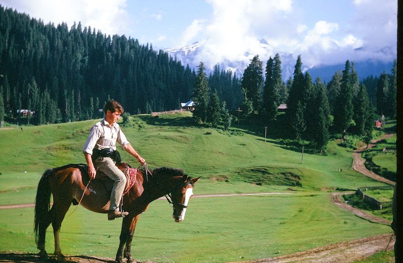 Author's friend Pete, astride pony in the Vale of Kashmir.